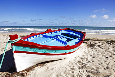 Small  boat on tourist beach the Mediterranean Sea, Djerba Island, Tunisia, North Africa, Africa