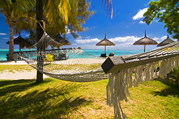 Hammock on the beach of the Beachcomber Le Paradis Hotel, Mauritius, Indian Ocean, Africa