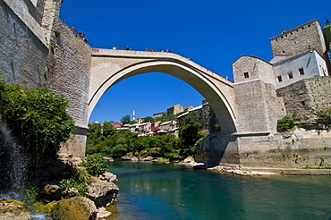 Famous old bridge reconstructed after collapsing in the war in the old town of Mostar, UNESCO World Heritage Site, Bosnia-Herzegovina, Europe