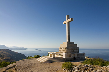 Huge Christian cross on top of the mountain above the old town of Dubrovnik, Croatia, Europe