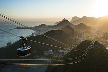 View from the Sugarloaf and the famous cable car at sunset, Rio de Janeiro, Brazil, South America 