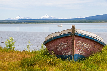 Little fishing boat in the bay of Puerto Natales, Patagonia, Chile, South America 