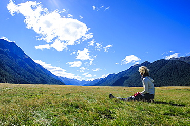 Tourist enjoying Eglinton Valley before the Milford Sound, South Island, New Zealand, Pacific