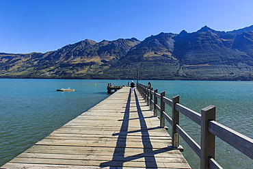 Wooden pier in the turquoise water of Lake Wakatipu, Glenorchy around Queenstown, Otago, South Island, New Zealand, Pacific