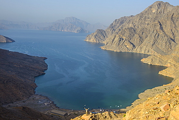 Woman at a viewing point over the Khor An-najd fjord, Musandam, Oman, Middle East