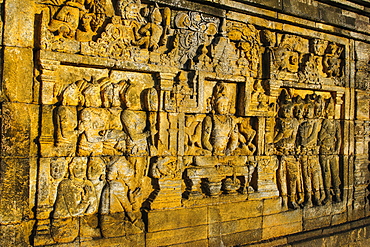 Buddha reliefs in the temple complex of Borobodur, UNESCO World Heritage Site, Java, Indonesia, Southeast Asia, Asia