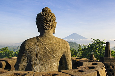 Sitting Buddha in the temple complex of Borobodur, UNESCO World Heritage Site, Java, Indonesia, Southeast Asia, Asia