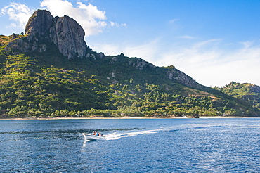 Little motorboat cruising before, Naviti island, Yasawas, Fiji, South Pacific, Pacific