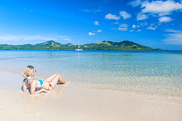 Woman enjoying at  the clear waters of Nanuya Lailai island, the blue lagoon, Yasawas, Fiji, South Pacific, Pacific