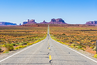 Long road leading into the Monument Valley, Arizona, United States of America, North America