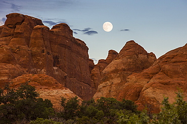 Full moon over Fiery Furnace, a maze like passageway, Arches National Park, Utah, United States of America, North America