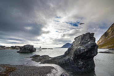 Expedition ship looking through the rocks of Alkhornet, Svalbard, Arctic