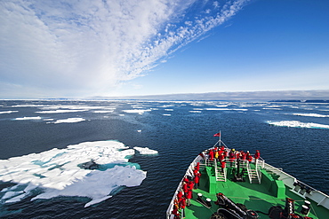 Expedition boat entering the pack ice in the Arctic shelf, Svalbard, Arctic