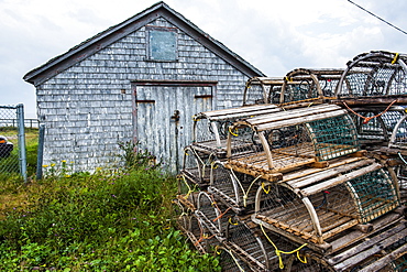 Fish traps in front of a shingle hut in Neils Harbour, Cape Breton Highlands National Park, Cape Breton Island, Nova Scotia, Canada, North America 