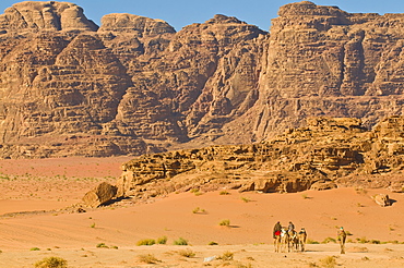 Camel caravan in the stunning desert scenery of Wadi Rum, Jordan, Middle East