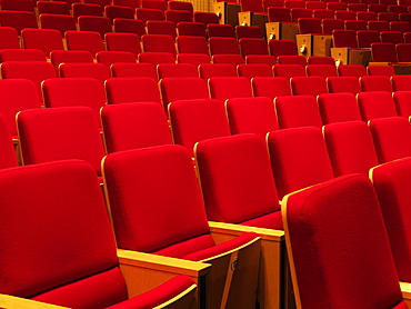 Rows of empty red seats in an auditorium, Manchester, England, United Kingdom, Europe