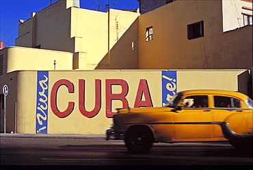 Street scene with old 1950s car, Havana, Cuba, West Indies, Central America