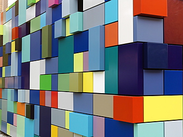 Colorful multi-colored building used as an entrance for parking garage at Discovery Park, Synchronicity of Color by Margo Sawyer, Houston, Texas, United States of America, North America