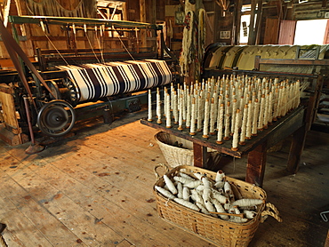 Upper Canada Village, recreation of pioneer life circa 1860s, loom using spun sheep wool, Morrisburg, Ontario, Canada, North America