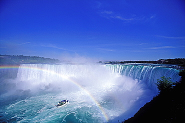 Rainbow over Maid of the Mist and Niagara Falls (Canadian Falls), Niagara Falls, Ontario, Canada, North America