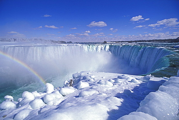 Horseshoe Falls in winter with rainbow, Niagara Falls, Ontario, Canada, North America