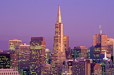 View of city skyline with TransAmerica Building at dusk, San Francisco, California, United States of America, North America