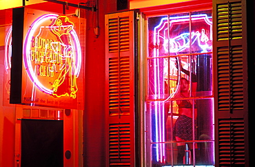 Strip club, Bourbon Burlesque Club with woman dancing in window, Bourbon Street, New Orleans, Louisiana, United States of America, North America