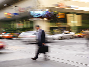 Pedestrian crossing street in the financial district of the city, Toronto, Ontario, Canada, North America