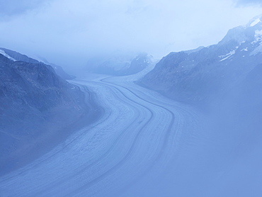 The Aletsch Glacier in mist, Aletsch, Goms Region, Switzerland, Europe