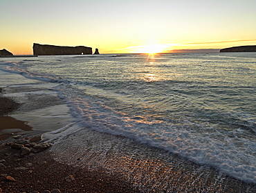 Perce Rock and the Gulf of St. Lawrence at sunrise, Perce, Gaspesie, Quebec, Canada, North America