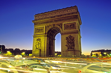 Arc de Triomphe and traffic at night, Paris, France, Europe