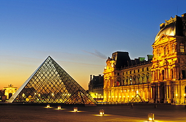 The Louvre and Pyramid by I M Pei, illuminated at dusk, Paris, France, Europe