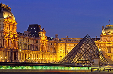 The Louvre and Pyramid by I M Pei, illuminated at night, Paris, France, Europe