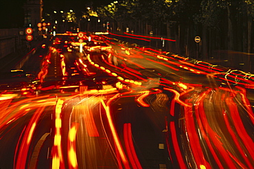 Traffic at night, time exposure of vehicle lights blurring, Paris, France, Europe