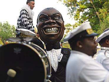 Person in Louis Armstrong costume, French Quarter second line parade, French Quarter, New Orleans, Louisiana, United States of America, North America