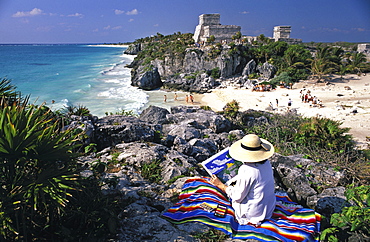 Woman sketching ruins, Tulum, Yucatan, Mexico, North America