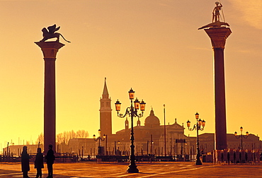 Columns of San Marco and San Teodoro with San Giorgio de Maggiore in the background at dawn, Venice, UNESCO World Heritage Site, Veneto, Italy, Europe