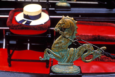 Detail of gondolier's hat and brass seahorse used for mooring, Venice, Veneto, Italy, Europe