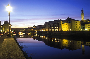 View of the Arno River at dusk with Ponte Vecchio in distance, Florence, Tuscany, Italy, Europe