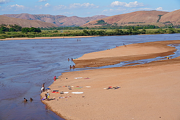 People washing clothes in the Manambolo River, Ambatolahy, Miandrivazo district, Menabe Region, Madagascar, Africa