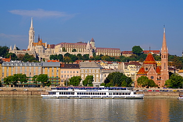 The Capuchin Church (Kapucinus Templom) and in the foreground the Matthias church and the Fishermen's bastion, Halaszbastya, Buda side of the River Danube, Budapest, Hungary, Europe