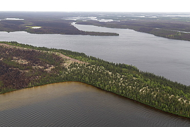 Aerial photography of an esker, a sandy ridge formed by subglacial deposits of sediment in the last Ice Age, in Manitoba, Canada, North America