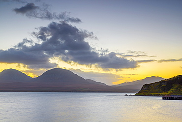 Isle of Jura and Paps of Jura Mountains across Bunnahabhain Bay and Sound of Islay from Islay, Argyll and Bute, Scotland, United Kingdom, Europe