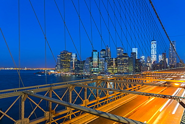 New York skyline, Manhattan, Brooklyn Bridge over East River, Lower Manhattan skyline, including Freedom Tower of World Trade Center, New York, United States of America, North America