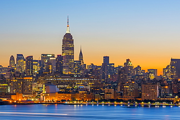 New York skyline with Midtown, Manhattan and Empire State Building viewed across Hudson River, New York, United States of America, North America