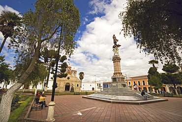 Statue of Vincente Maldonado and the Cathedral at Parque Maldonado in this colonial-style provincial capital, Riobamba, Chimborazo Province, Central Highlands, Ecuador, South America