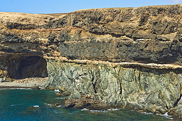 Unconformity of older Jurassic sediments and Pliocene limestone plus later lava on top at Caleta Negra, Ajuy, Fuerteventura, Spain, Atlantic, Europe