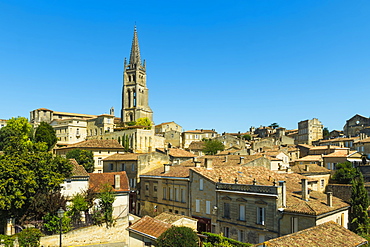 The 53 metre bell tower of the 13th century church in this historic town and famous Bordeaux red wine region, Saint Emilion, Gironde, France, Europe