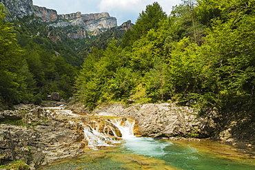 Waterfall on Rio Bellos river in the limestone Anisclo Canyon, Ordesa National Park, Anisclo, Pyrenees, Aragon, Spain, Europe