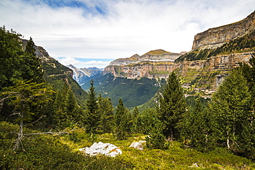 View west along the Ordesa Valley to distant Mondarruego and Otal peaks, Ordesa National Park, Pyrenees, Aragon, Spain, Europe